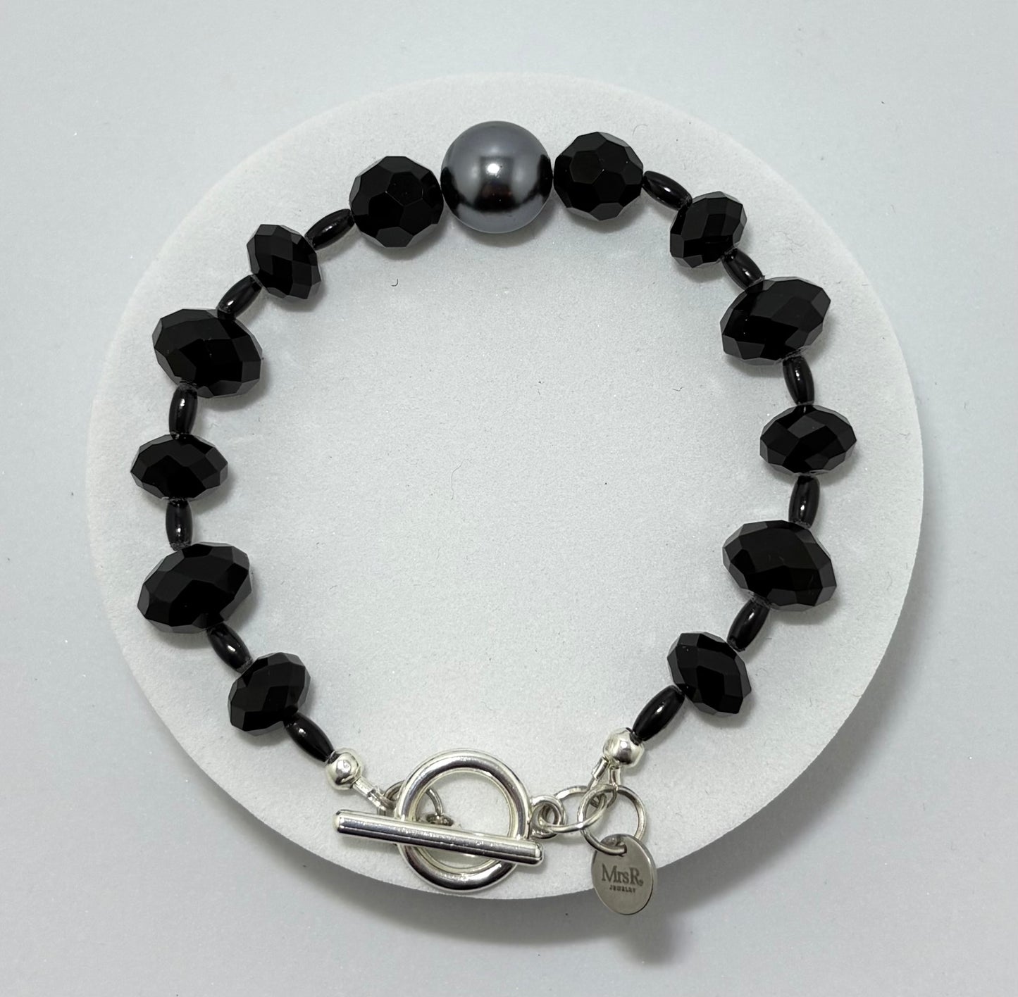 Woman in Black armband